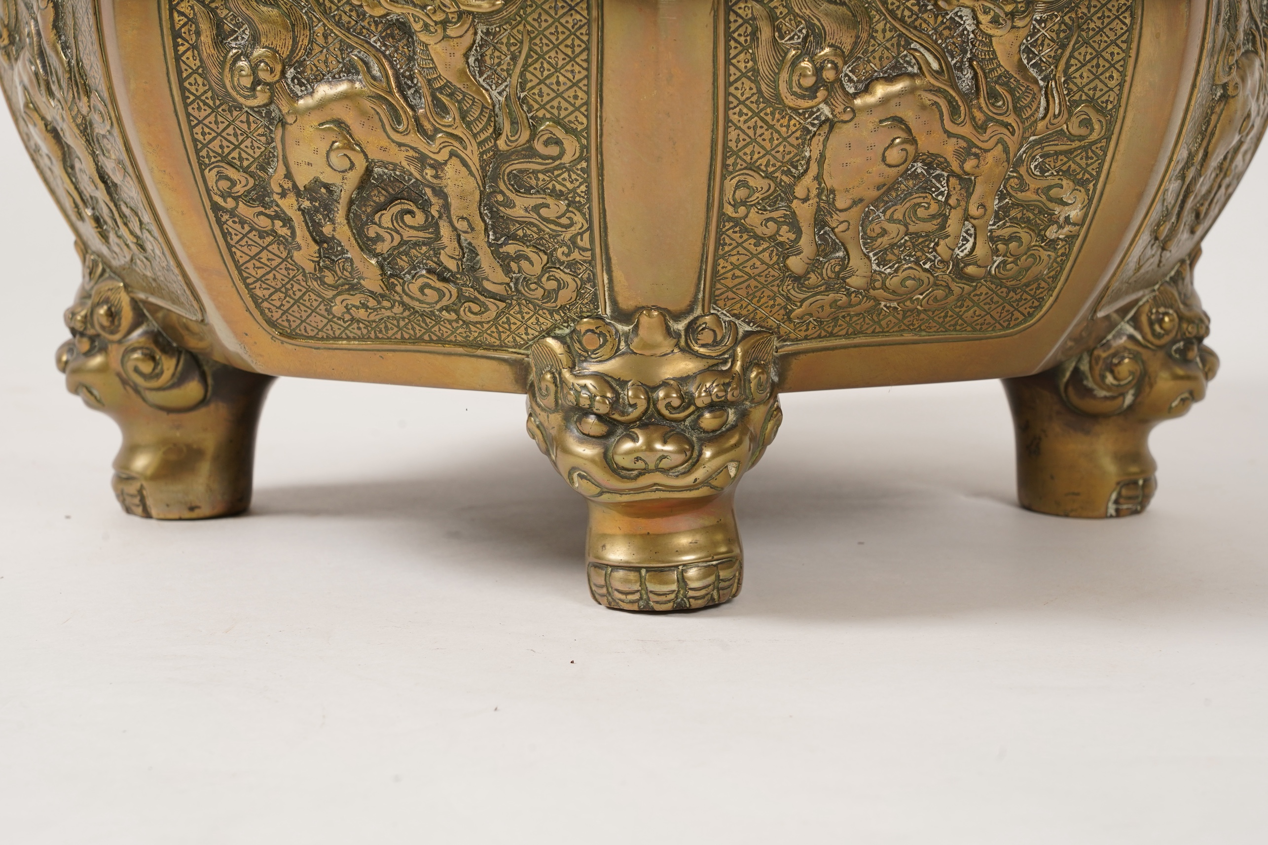 A large Chinese or Japanese bronze octagonal jardiniere, 19th century